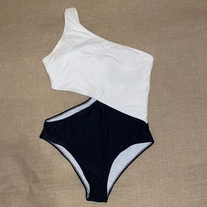 Black and white one piece swimsuit with cutout